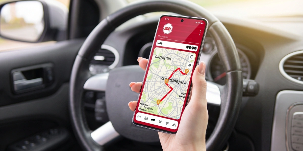 Celular con la app DAI mostrando la ruta de un vehículo entre Guadalajara y Zapopan